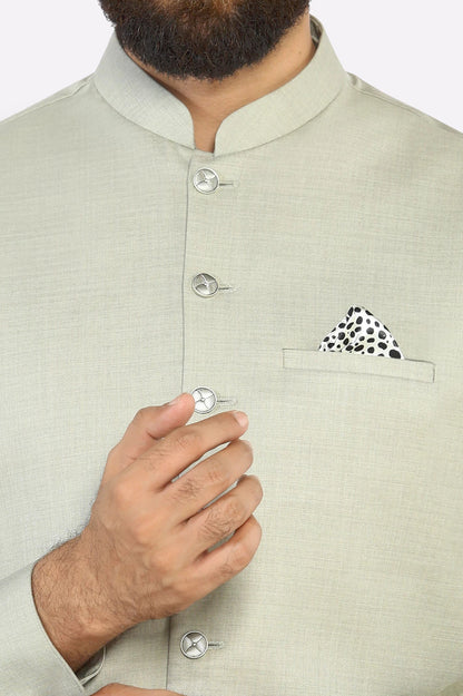 Green Shalwar Kameez with Waistcoat
